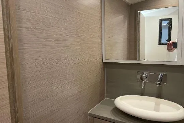 Slide: The Image of 2023 Fjord 38 Xpress bathroom with modern sink and mirror. - 16