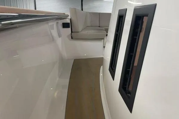 Slide: The Image of 2023 Fjord 38 Xpress boat interior with sleek design and comfortable seating. - 19
