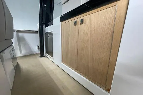 Slide: The Image of 2023 Fjord 38 Xpress interior with modern cabinetry and sleek design. - 30