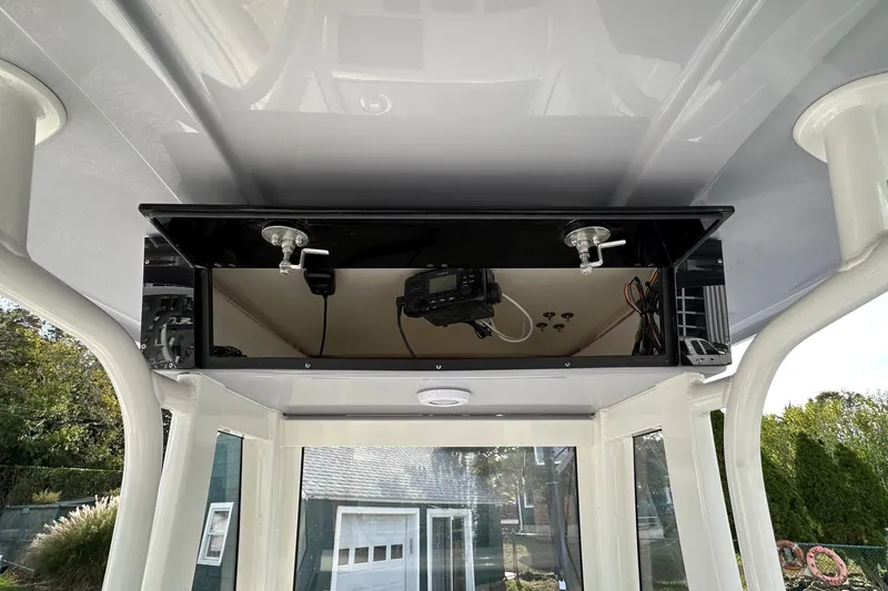 Slide: The Image of 2026 Key West 239 FSR boat console with electronic equipment and wiring. - 20