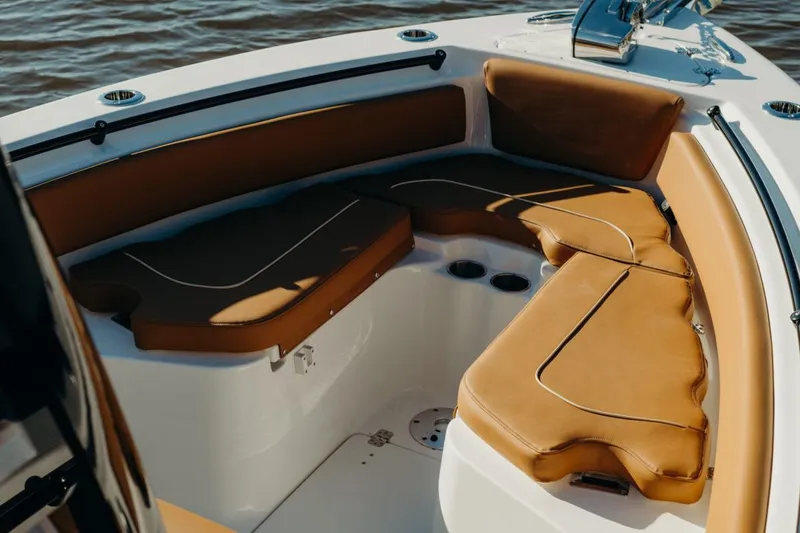 Slide: The Image of 2026 Key West 239 FSR boat with Yamaha 350 V6 engine, parked near a "Slow 5 MPH" sign. - 3