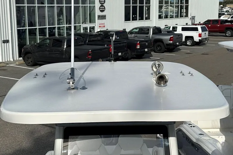 Slide: The Image of 2026 Key West 239 FSR boat roof with antenna and horn, dealership background. - 33