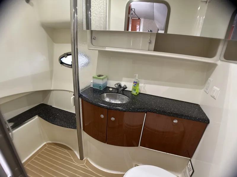 Slide: The Image of 2006 Formula 40 PC yacht bathroom with modern sink, mirror, and storage cabinets. - 32