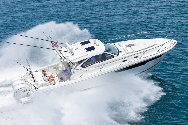 Slide: The Image of Manufacturer Provided Image: 2025 Pursuit OS 405 Offshore boat cruising on open water, showcasing speed and luxury. - 1