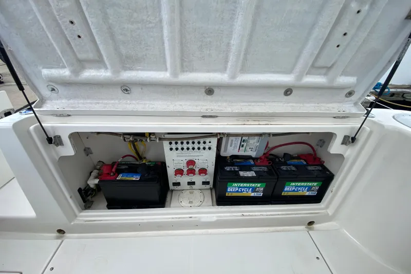 Slide: The Image of Interstate deep cycle marine batteries in a 2007 Robalo R305 Walkaround boat. - 42
