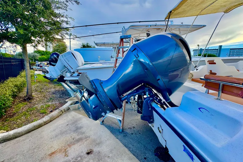 Slide: The Image of Interior view of a 2006 Century 1850 Mustang boat at a marina. - 24