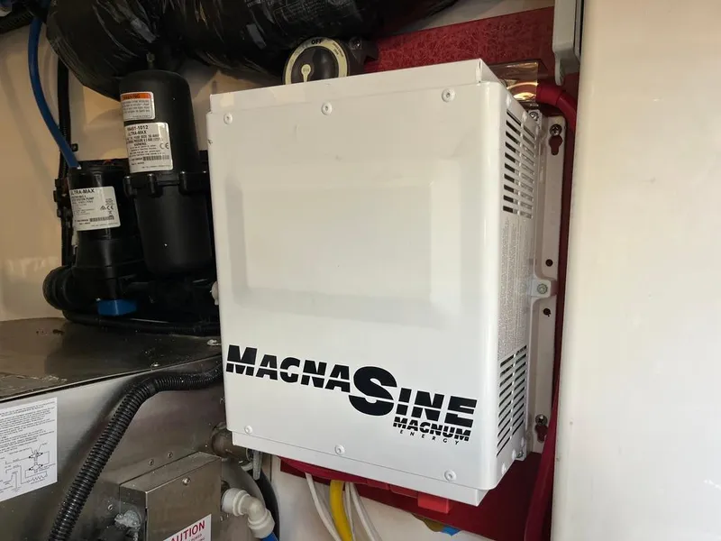Slide: The Image of Magnum Energy inverter in 2004 Cabo 35 Express boat engine room. - 47