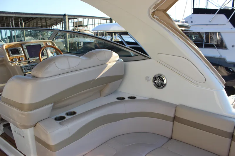Slide: The Image of 2008 Formula 34 Performance Cruiser interior with beige seating and modern dashboard. - 20