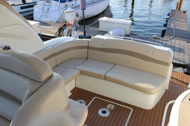 Slide: The Image of 2008 Formula 34 Performance Cruiser with beige seating, docked at marina. - 25