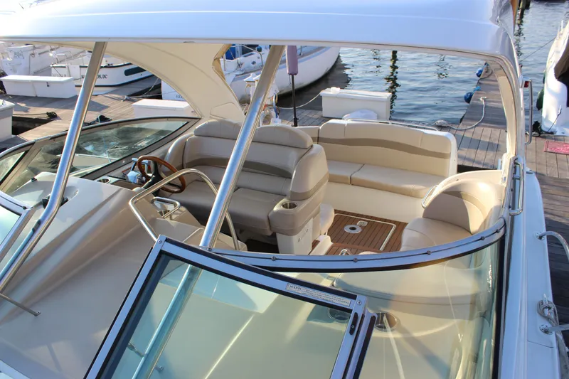 Slide: The Image of 2008 Formula 34 Performance Cruiser with spacious seating and elegant design at the dock. - 31