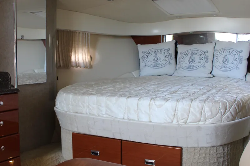 Slide: The Image of Luxurious cabin interior of 2008 Formula 34 Performance Cruiser with plush bedding and elegant decor. - 36