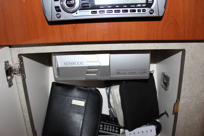 Slide: The Image of Cabinet with Kenwood audio system in 2008 Formula 34 Performance Cruiser. - 42
