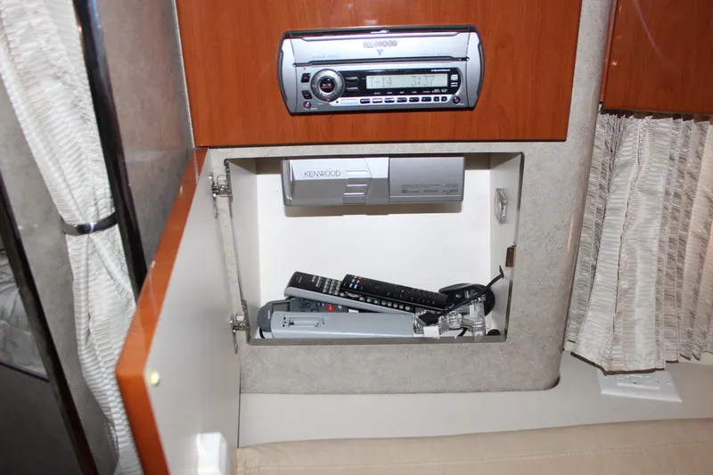 Slide: The Image of 2008 Formula 34 Performance Cruiser interior with Kenwood stereo and remote controls. - 43