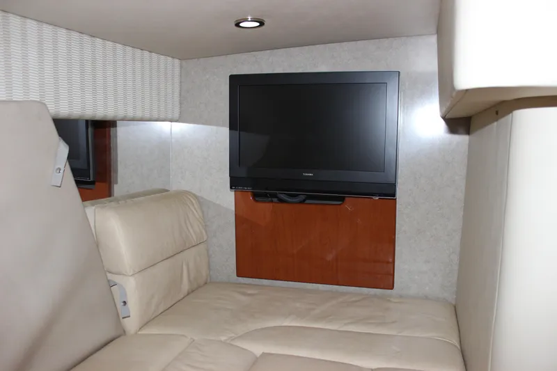 Slide: The Image of Interior of 2008 Formula 34 Performance Cruiser with TV and beige seating. - 47