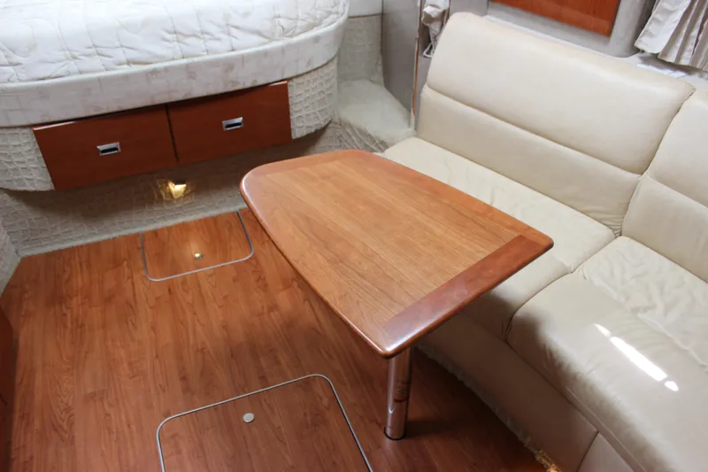 Slide: The Image of Interior of 2008 Formula 34 Performance Cruiser with wood table and beige seating. - 50