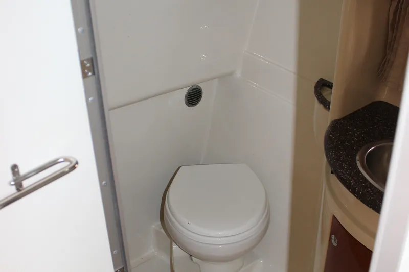 Slide: The Image of 2008 Formula 34 Performance Cruiser bathroom with toilet and sink. - 59