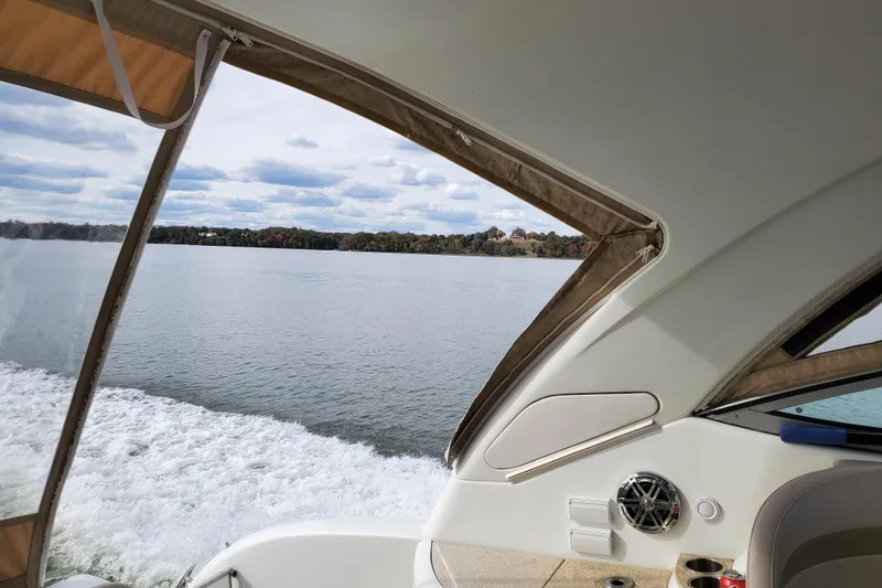 Slide: The Image of 2008 Formula 34 Performance Cruiser interior view with scenic lake backdrop. - 69