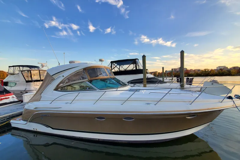 Slide: The Image of 2008 Formula 34 Performance Cruiser docked at marina under blue sky. - 73