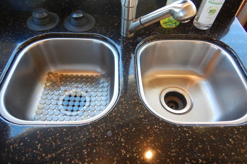 Slide: The Image of Stainless steel double sink with modern faucet on a Meridian 411 Sedan yacht, 2008 model. - 13