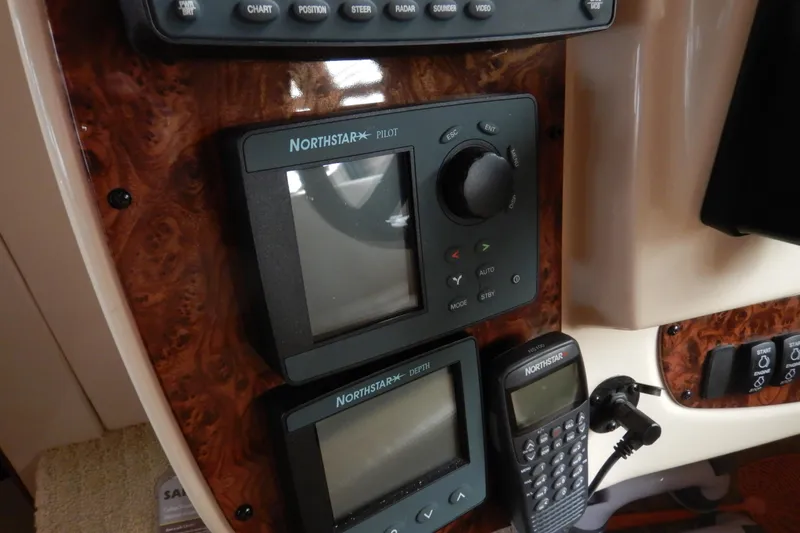 Slide: The Image of Control panel of a 2008 Meridian 411 Sedan with Northstar navigation equipment. - 18