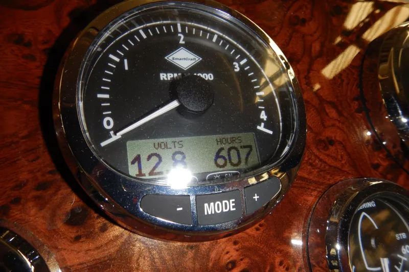 Slide: The Image of Close-up of a SmartCraft gauge on a 2008 Meridian 411 Sedan boat dashboard. - 20