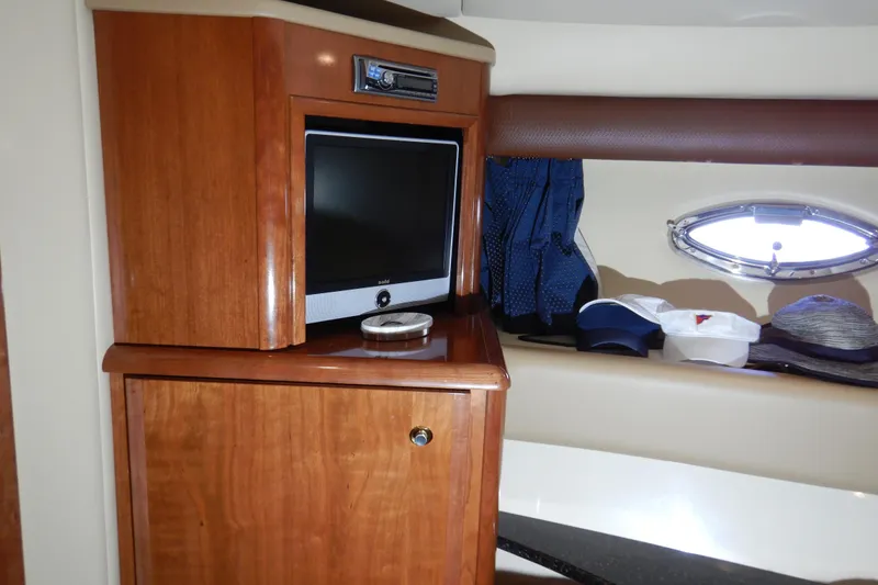 Slide: The Image of Interior of 2008 Meridian 411 Sedan with TV and wooden cabinetry. - 27