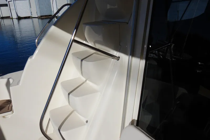 Slide: The Image of Staircase on 2008 Meridian 411 Sedan yacht with stainless steel railing. - 32