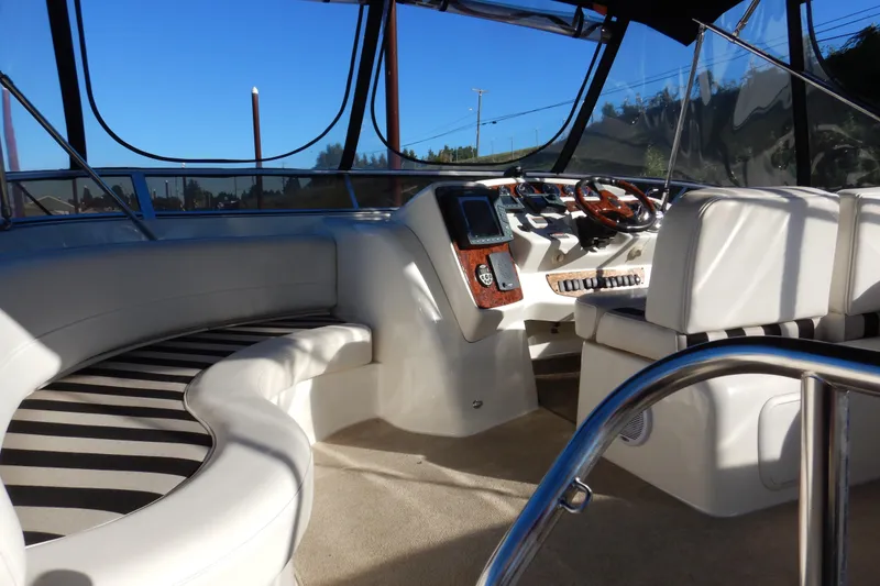 Slide: The Image of Luxurious interior of 2008 Meridian 411 Sedan yacht with plush seating and modern controls. - 33