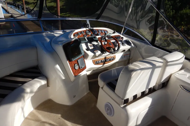 Slide: The Image of 2008 Meridian 411 Sedan helm with luxurious seating and advanced navigation controls. - 34