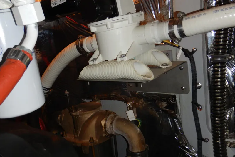 Slide: The Image of Engine room of 2008 Meridian 411 Sedan with hoses and mechanical components. - 49