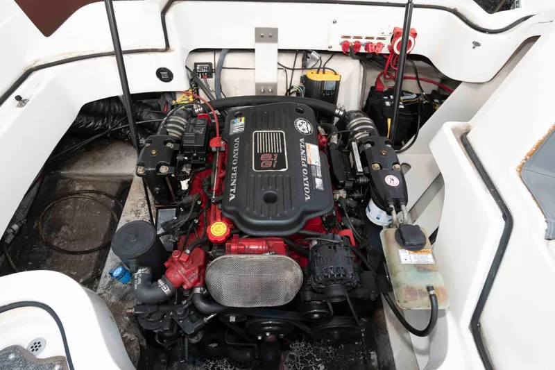 Slide: The Image of Engine compartment of a 2007 Cobalt 252 boat featuring a Volvo Penta engine. - 12