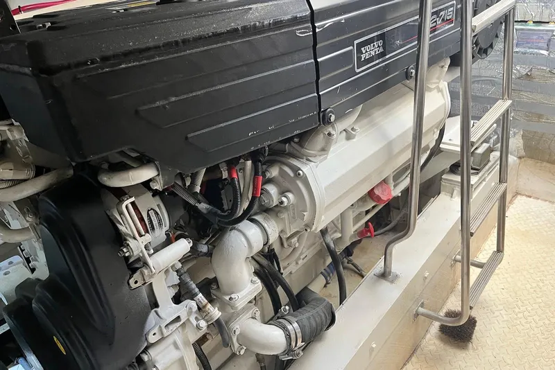 Slide: The Image of Engine of 2006 Cruisers Yachts 520 Express with Volvo Penta branding. - 17