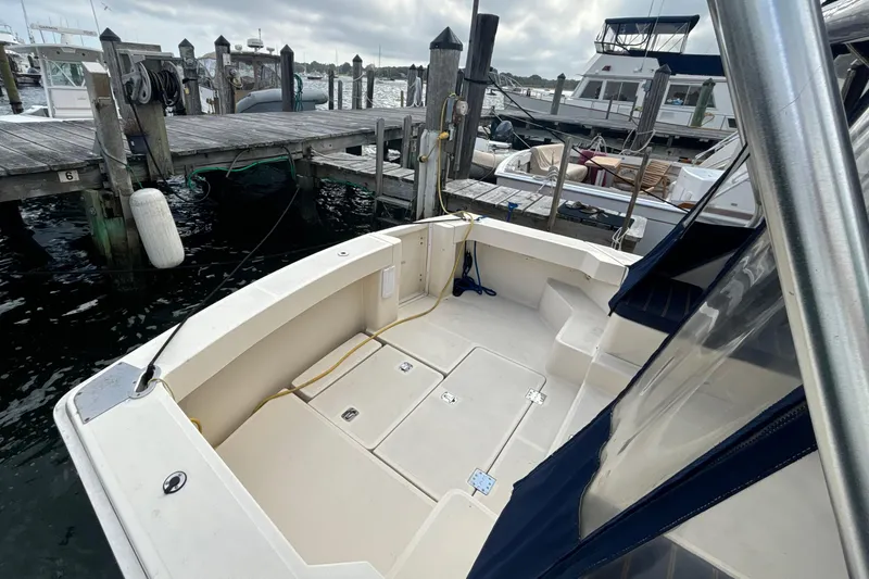 Slide: The Image of Bow of 2005 Mainship Pilot 34 with anchor and marine equipment. - 7