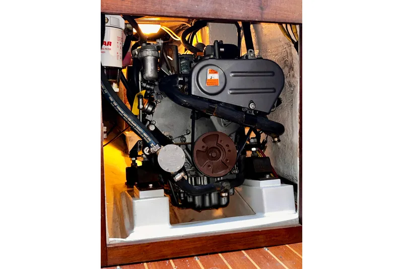 Slide: The Image of Engine compartment opening into cabin with 2018 Yanmar 3YM30 w/330 hrs. - 18