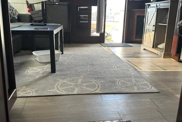 Slide: The Image of Interior of a 1986 Egg Harbor 37 Convertible yacht with modern furnishings. - 19