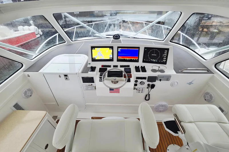 Slide: The Image of 2022 Albemarle 36 Express boat with tower against clear blue sky. - 10