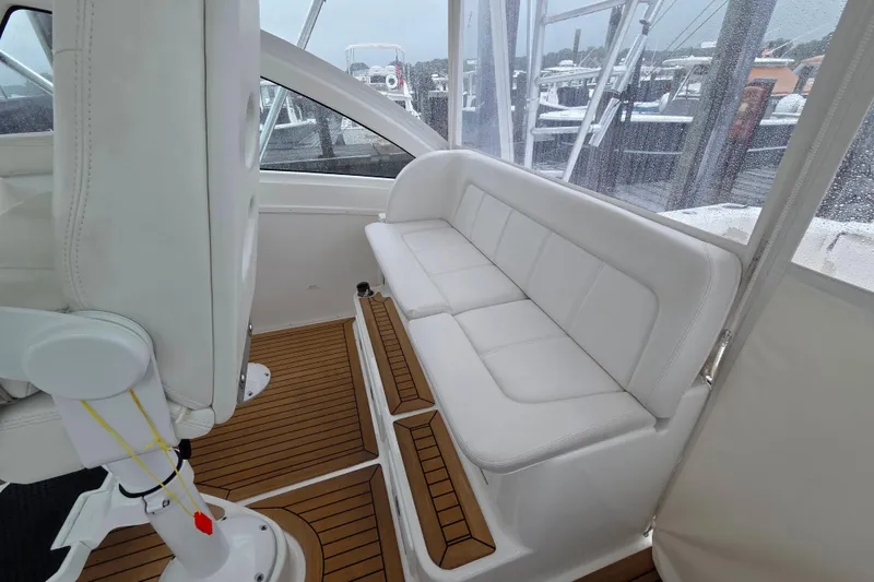 Slide: The Image of Interior of 2022 Albemarle 36 Express boat with modern helm and seating. - 18
