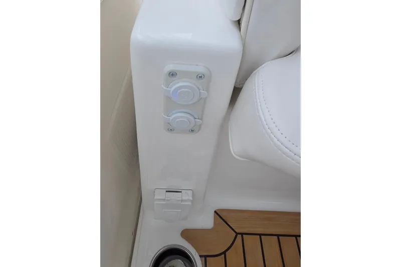 Slide: The Image of 2022 Albemarle 36 Express boat interior with helm, navigation screens, and seating. - 19