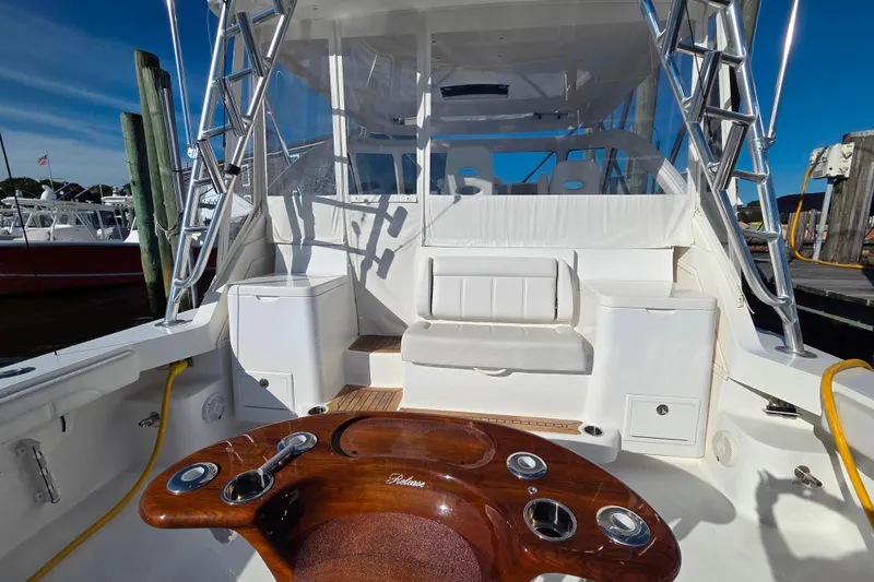 Slide: The Image of Dual electric fishing reels on a 2022 Albemarle 36 Express boat. - 23