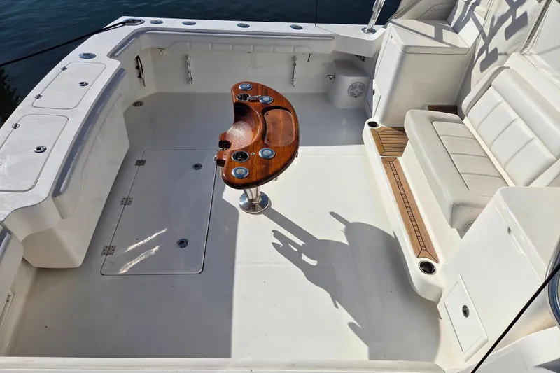 Slide: The Image of 2022 Albemarle 36 Express boat interior with seating and fishing station. - 25