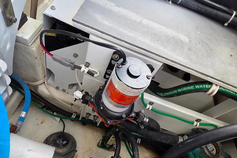 Slide: The Image of Engine room of 2022 Albemarle 36 Express boat, featuring advanced machinery and control panels. - 39