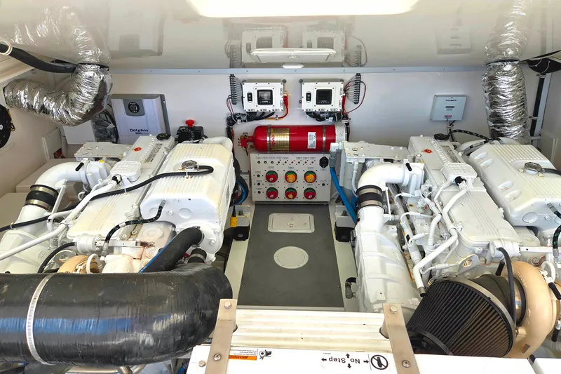 Slide: The Image of Engine room of 2022 Albemarle 36 Express with dual engines and control systems. - 43