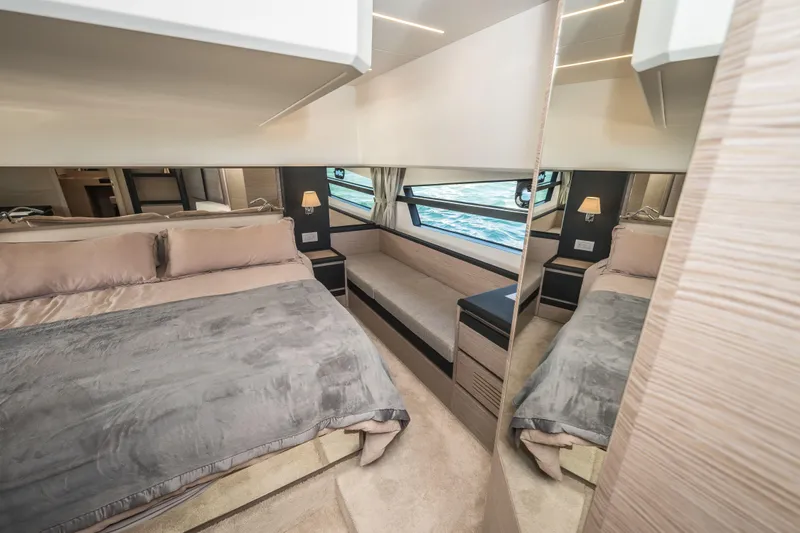 Slide: The Image of Luxurious interior of 2024 Greenline 45 Coupe Hybrid yacht bedroom with elegant furnishings. - 13
