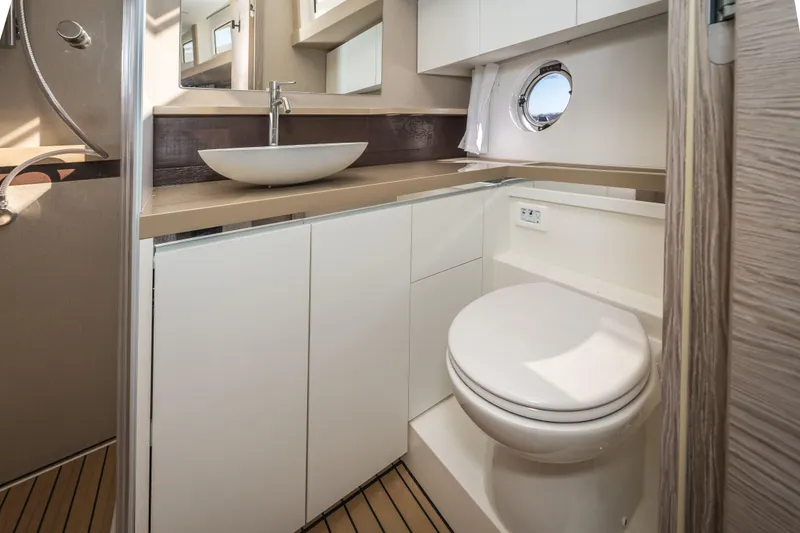 Slide: The Image of 2024 Greenline 45 Coupe Hybrid yacht bathroom with modern fixtures and sleek design. - 18