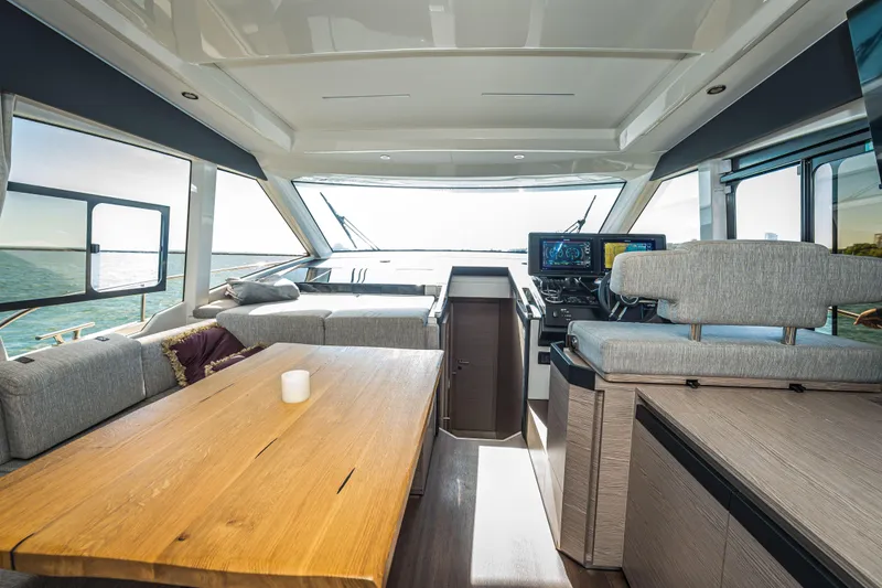Slide: The Image of Interior of 2024 Greenline 45 Coupe Hybrid yacht, featuring modern design and spacious seating. - 7