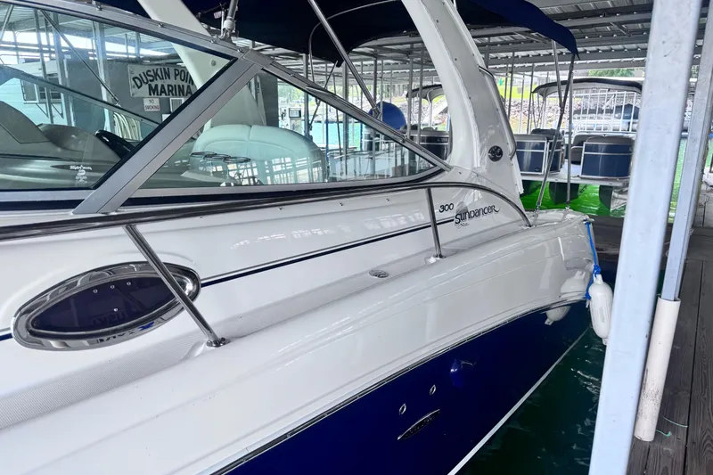 Slide: The Image of 2005 Sea Ray 300 Sundancer docked at Duskin Point Marina. - 6