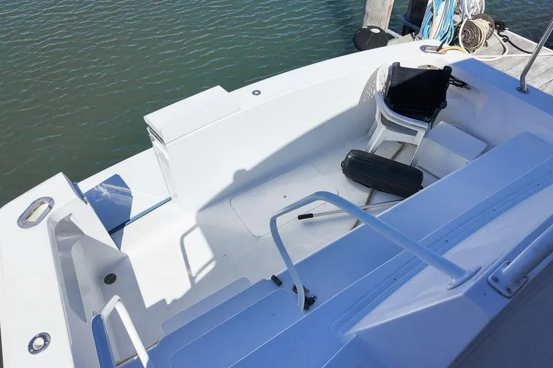 Slide: The Image of Control panel of a 1999 Viking Cockpit Sports Yacht with joystick and switches. - 29