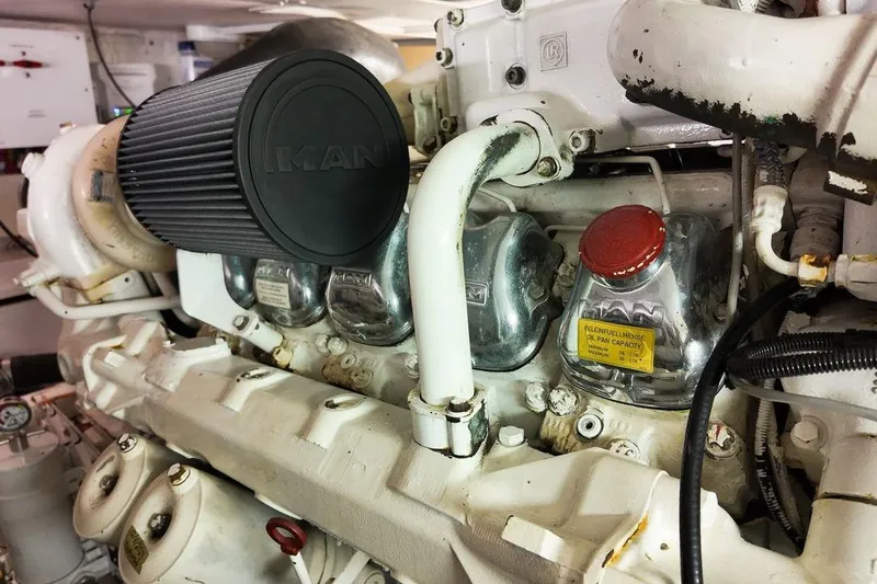 Slide: The Image of 1999 Viking Cockpit Sports Yacht deck with mooring equipment and neighboring yachts. - 34