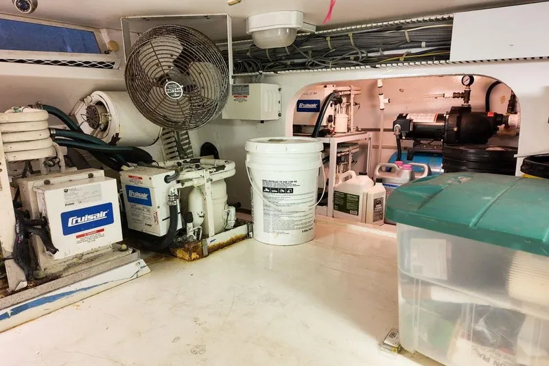 Slide: The Image of Luxurious interior of 1999 Viking Cockpit Sports Yacht with elegant seating and modern amenities. - 38