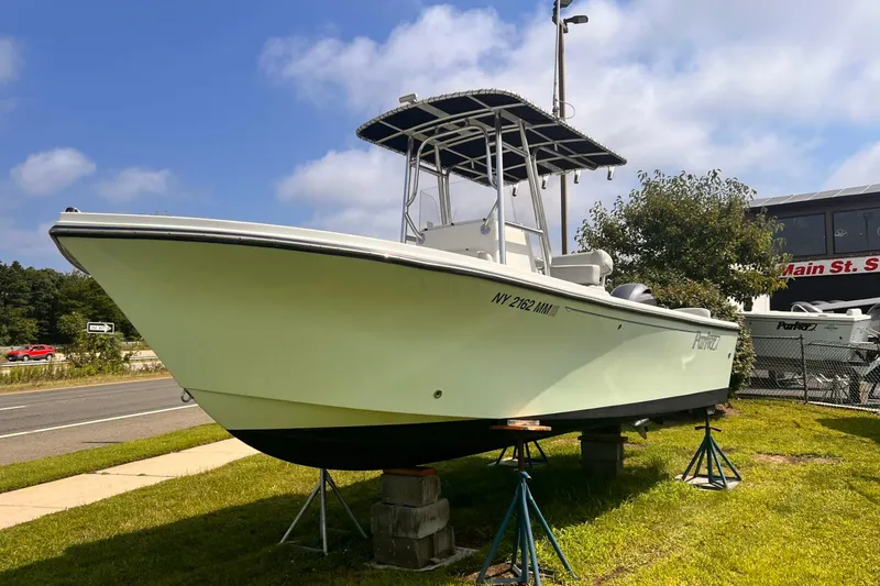 The Image of 2016 Parker 2100 Special Edition boat on stands, displayed outdoors. - 1